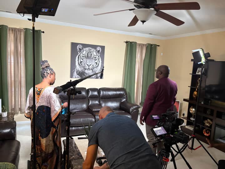 Living room set with lights, boom and camera